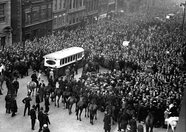 Mounted and foot officers engaged in policing the General Strike in Glasgow in 1926
