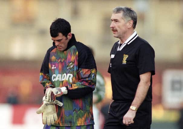 Darren Jackson takes over in goal after Hibs 'keeper Jim Leighton went off injured in a Celtic-Hibs match in February 1996. Picture: SNS Group