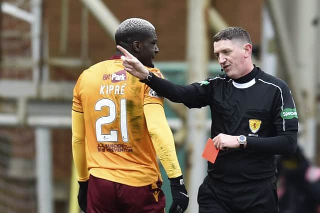 Craig Thomson gives Cedric Kipre his marching orders. Picture: SNS Group