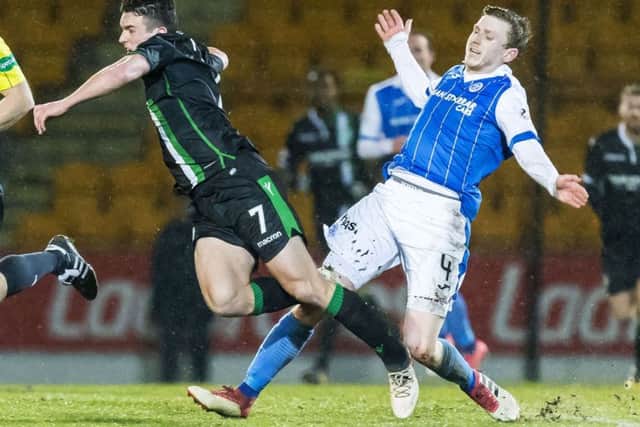 St Johnstone's Blair Alston fouls John McGinn. Picture: SNS