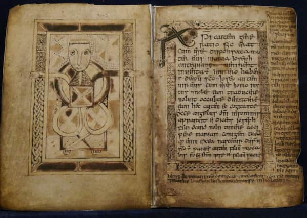 Pages of The Book of Deer which shows the Latin gospel text and Scottish Gaelic written in the margin. PIC: Courtesy of The Book of Deer Project.