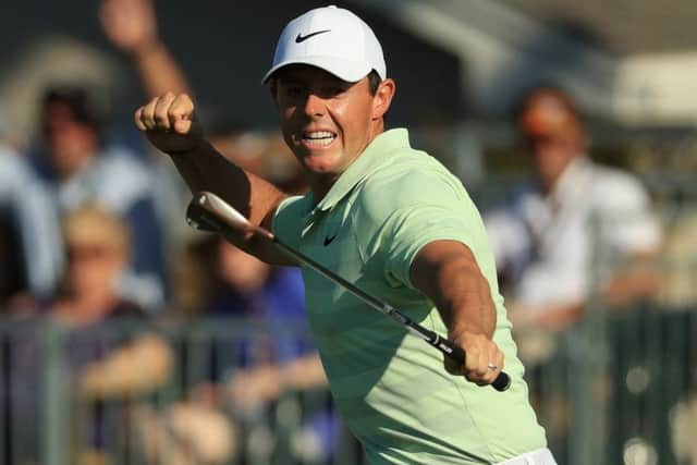Rory McIlroy punches the air after holing a birdie putt on the 15th during his triumphant final round at Bay Hill. Picture: Mike Ehrmann/Getty Images