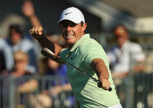 Rory McIlroy punches the air after holing a birdie putt on the 15th during his triumphant final round at Bay Hill. Picture: Mike Ehrmann/Getty Images