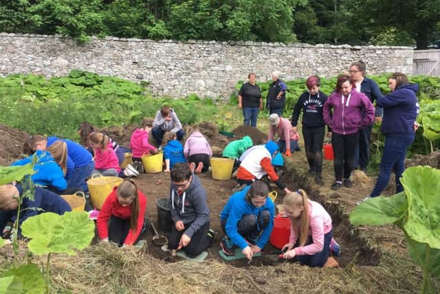 Students joing in with the dig at Old Deer with the search for the lost monastery now spanning 10 years. PIC: BBC Alba.