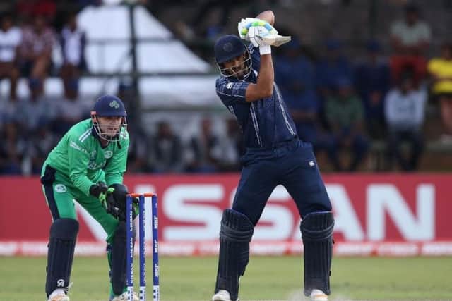 Safyaan Sharif hits out during Scotland's defeat by Ireland. The Scots must now beat West Indies to reach the World Cup. Picture: ICC