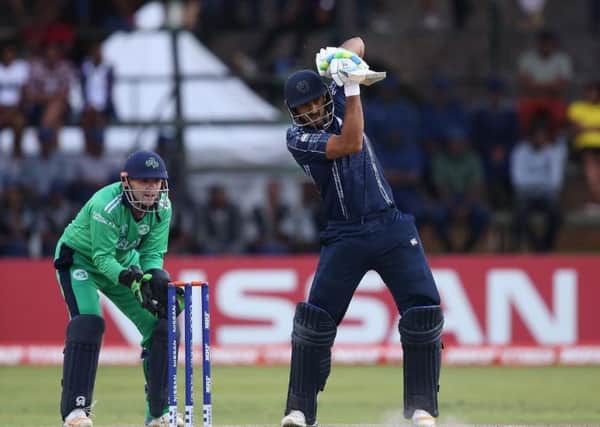 Safyaan Sharif hits out during Scotland's defeat by Ireland. The Scots must now beat West Indies to reach the World Cup. Picture: ICC