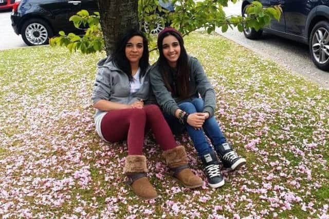 Anna Khan with her twin sister Lauren. Anna, 22, from Edinburgh, sustained a serious traumatic brain injury, a fractured face and hip, a broken leg and a punctured lung in December 2015 after being hit by a car in Rotherham, South Yorkshire