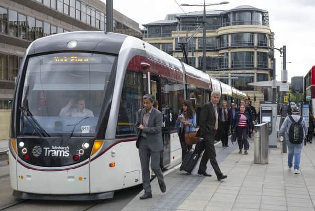 Passengers disembark an east-bound tram at Haymarket. 
Picture: Ian Rutherford