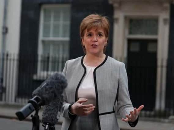 First Minister Nicola Sturgeon wants a "sunset clause" in UK Brexit Bill