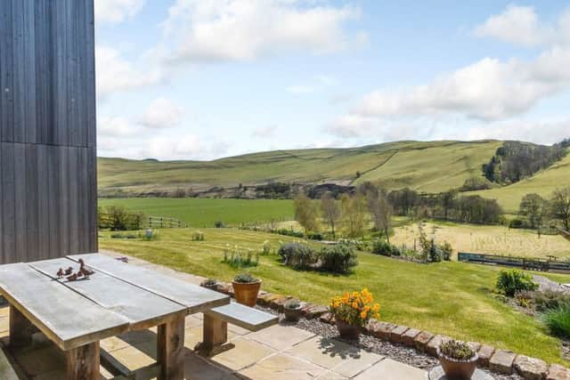 The terrace has  views across fields to hills. Pic: Strutt & Parker