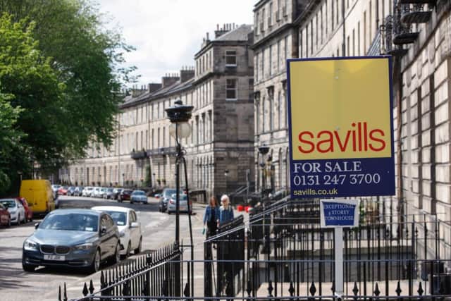 For sale signs can be seen on Abercromby Place in Edinburgh. Picture: Toby Williams