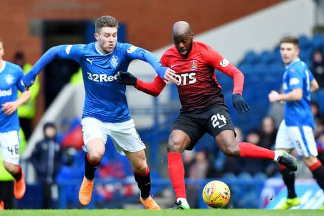 Josh Windass battles for the ball with Kilmarnock's Youssouf Mulumbu during the recent Scottish Premiership clash. Picture: SNS Group