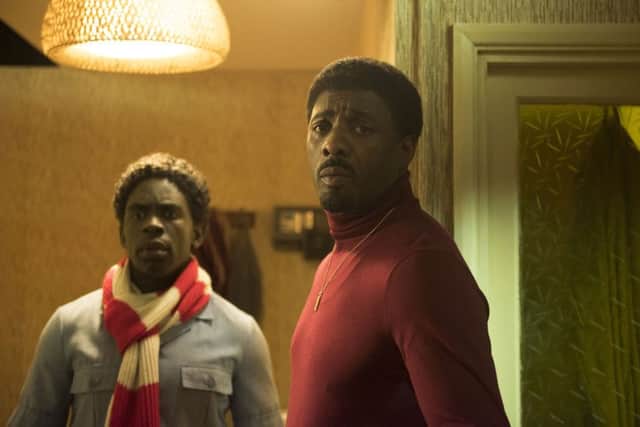 (L-R) Jimmy Akingbola as Valentine and Idris Elba as Walter. Picture: PA