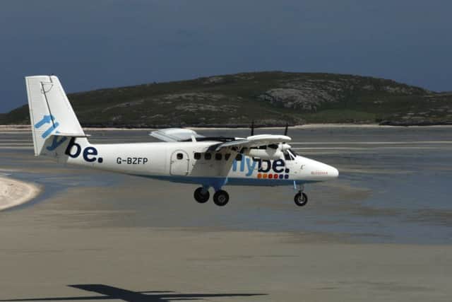 A plan comes in to land on the beach at Barra. Pic: Contributed