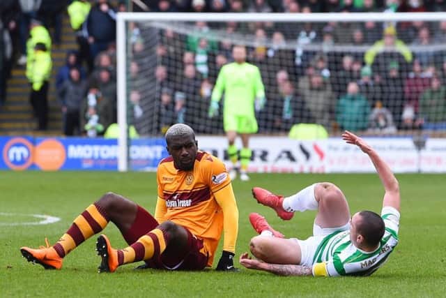 Cedric Kipre was sent off after clashing with Scott Brown. Picture: SNS