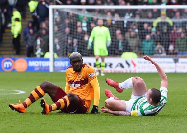 Cedric Kipre was sent off after clashing with Scott Brown. Picture: SNS