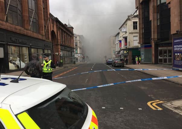 The scene in Glasgow city centre where firefighters are tackling a large blaze on Sauchiehall Street near the junction with Hope Street. Picture; PA