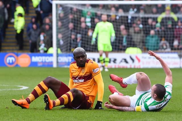 Cedric Kipre, seen here with Scott Brown at the moment of the incident, has won his appeal. Picture: SNS Group