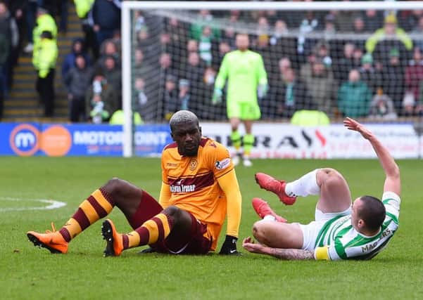 Cedric Kipre, seen here with Scott Brown at the moment of the incident, has won his appeal. Picture: SNS Group