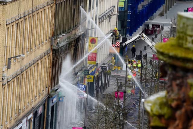 Fire crews battle to put out a fire on Glasgow's Sauchiehall Street