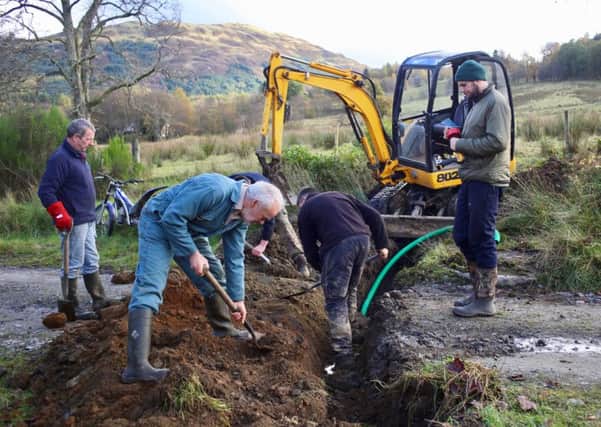 Volunteers in Balquhidder dug trenches to lay fibre optic cable for the the community's broadband network