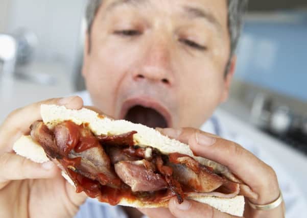Eating processed meat like bacon and sausages has been linked to an increased risk of cancer (Picture: Getty)