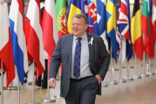 Denmark's Prime minister Lars Lokke Rasmussen arrives on the first day of a summit of European Union (EU) leaders at the EU headquarters in Brussels. Picture: Getty Images