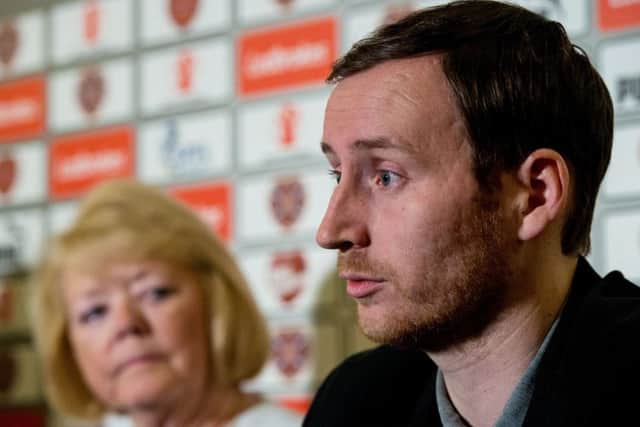 Ian Cathro addresses the media as Ann Budge looks on. File picture: SNS Group