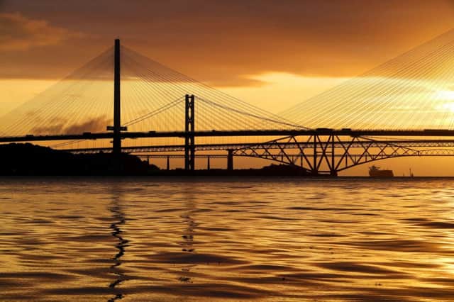 The three Forth bridges at sunset. Picture: Jane Barlow/PA