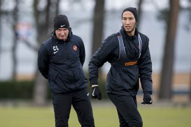Csaba Laszlo, left, is hoping Bilel Mohsni can shore up his defence. Picture: SNS Group