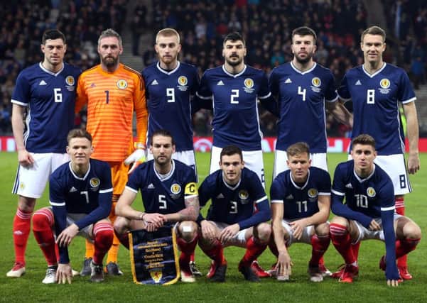 Scotland's starting XI line up before the game. Picture: Jane Barlow/PA
