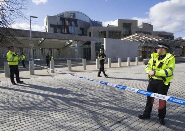 Police cordon outside the Scottish Parliament at Holyrood after reports of an incident, Picture: Ian Rutherford