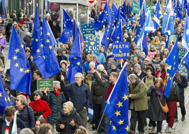 Pro-Europe marchers on Edinburghs Royal Mile yesterday. Picture: Ian Rutherford