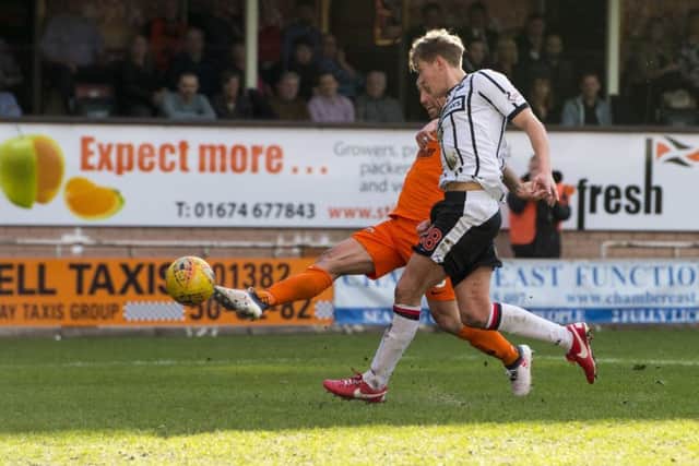 Scott McDonald scores for Dundee United. Picture: SNS/Ross Parker