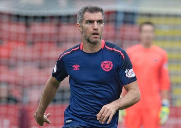 Aaron Hughes was injured playing for Northern Ireland against South Korea. Picture: SNS