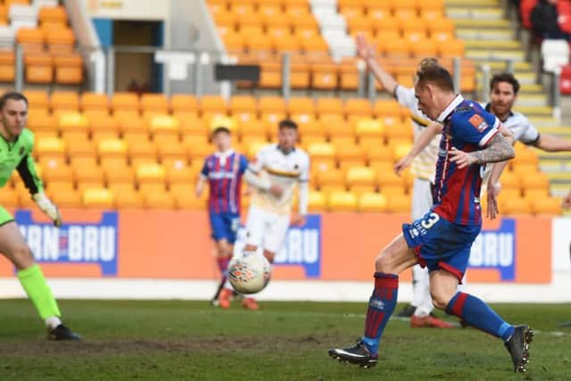 Inverness's Carl Tremarco scores the game's only goal. Picture: SNS/Paul Devlin
