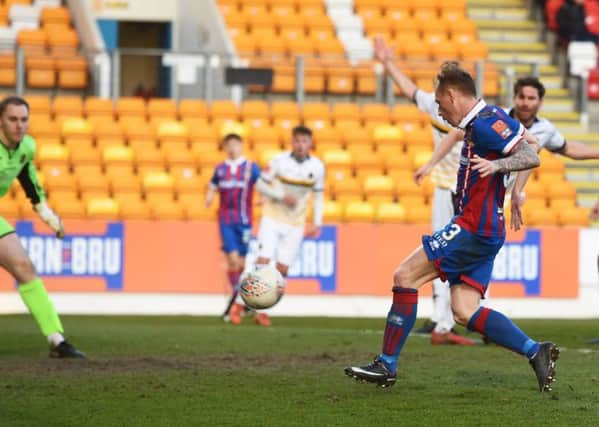 Inverness's Carl Tremarco scores the game's only goal. Picture: SNS/Paul Devlin