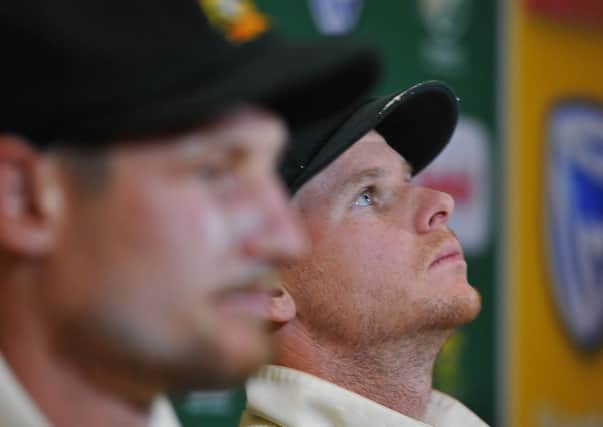 Captain Steven Smith and Cameron Bancroft, left, of Australia have admitted foul play. Photo: Ashley Vlotman/Gallo Images/Getty Images