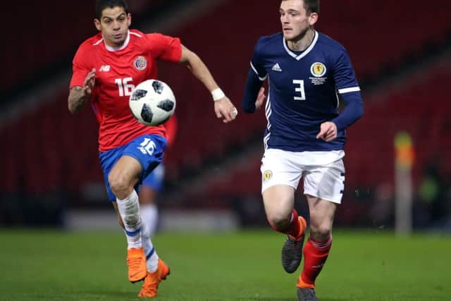 Costa Rica's Cristian Gamboa and Scotland's Andrew Robertson. Picture: Jane Barlow/PA Wire