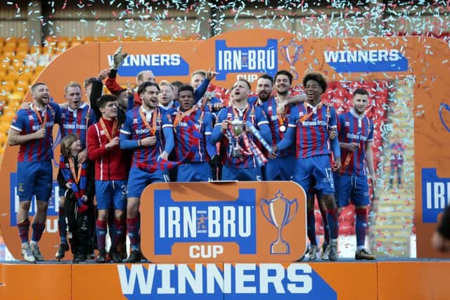 Inverness Caley Thistle players celebrate their Irn Bru Cup final victory over Dumbarton. Picture: PA.