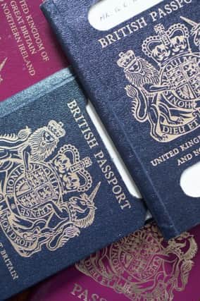 The old blue British passport that is returning alongside the existing red design