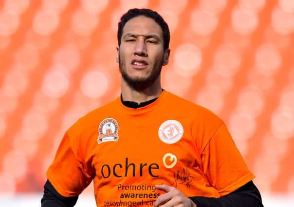 Dundee Utd's Bilel Mohsni warming up prior to Saturday's game. Picture: SNS