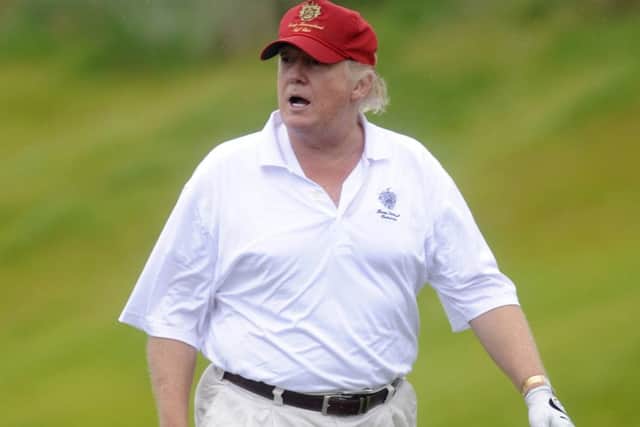 Donald Trump at the 2012 opening of his Trump International Golf Links course in Aberdeenshire. The future president was opposed to a windfarm development off the coast. Picture: Phil Wilkinson/TSPL