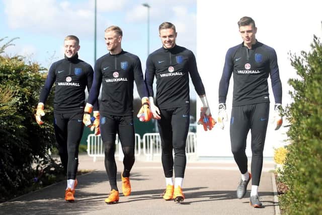 Goalkeepers Jordan Pickford, Joe Hart, Jack Butland and Nick Pope head out for training yesterday. Picture: PA.