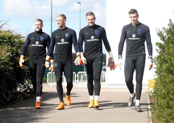 Goalkeepers Jordan Pickford, Joe Hart, Jack Butland and Nick Pope head out for training yesterday. Picture: PA.