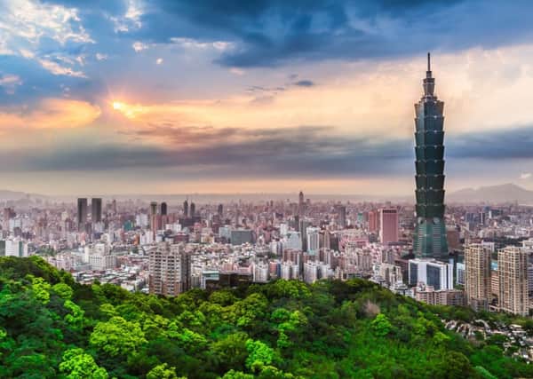 A view of Taipei, Taiwan, dominated by the Tapei 101 tower, formerly the tallest building in the world