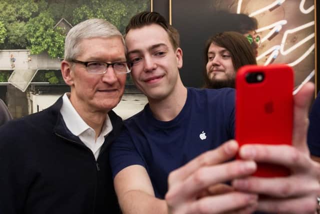 Apple CEO Tim Cook, left, argues that all companies should have values. Picture: John Devlin.