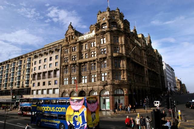 One of the Megabus coaches passed by the front of Jenners in Edinburgh