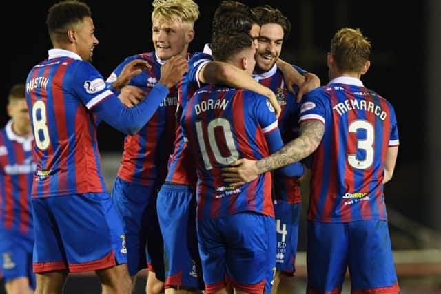 Inverness goalscorer Aaron Doran celebrates with his team-mates. Picture: SNS