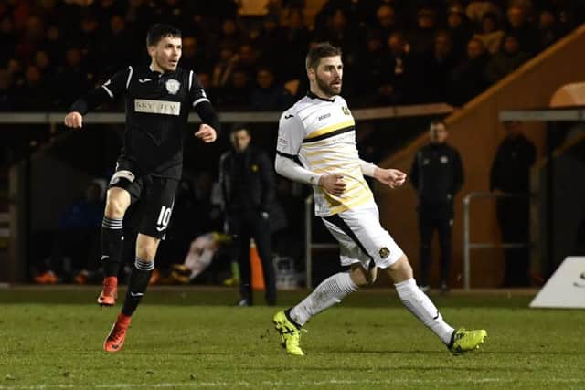 St Mirren's Lewis Morgan strikes to score his side's fifth goal. Picture: SNS
